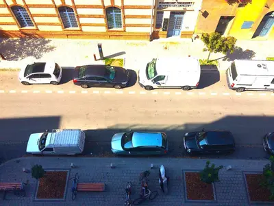 an overhead view of cars parked in a parking lot at Apartament nad Wisłą in Kraków