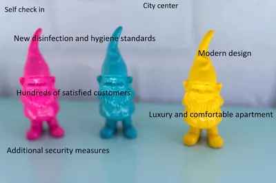 a group of toy figurines sitting next to each other at Cheerful Air Conditioned Apartment with mezzanine and Parking - Old Town in Kraków