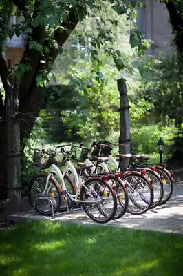 a row of bikes parked next to each other at Zulian Aparthotel by Artery Hotels in Kraków