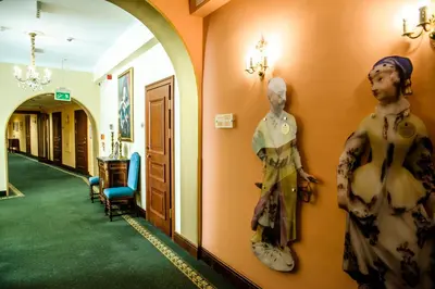 a room with a mannequin on the wall at Hotel Polski Pod Białym Orłem in Kraków