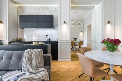 a living room with a couch and a table at apartament PAULOVE in Kraków