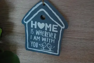 a home is where i am with you sign on a wall at Apartament Myślenice in Myślenice