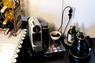a counter top with a toaster and a toaster and a blender at Verona Apartment 129 - 70m2, Terrace, Garage in Kraków
