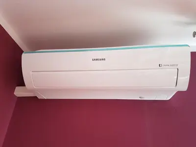 a white printer is hanging from a ceiling at Verona Apartment 129 - 70m2, Terrace, Garage in Kraków