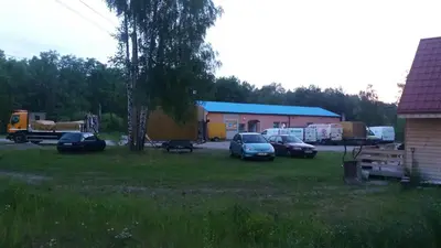 a group of cars parked in front of a building at Antares noclegi u Basi in Młoszowa