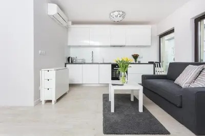 a living room with a couch and a table at apartament studio solna 1 M19 in Kraków