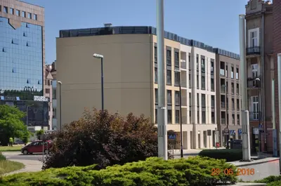 a building with a street light in a city at apartament studio solna 1 M19 in Kraków