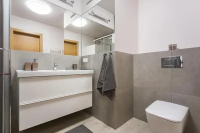 a bathroom with a sink and a toilet at apartament studio solna 1 M19 in Kraków