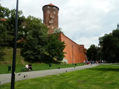 a large brick building with a tower on top of it at Studio Na Powiślu in Kraków