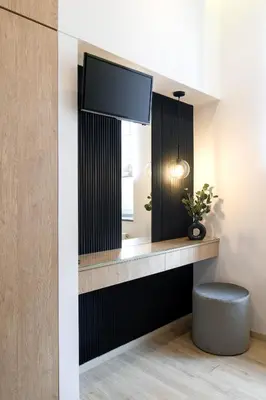 a dressing room with a mirror and a tv at Beautiful Apartment with 2 bedrooms for 7 guests, Jewish District in Kraków