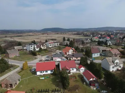 an aerial view of a small town with houses at Apartamenty Nad Wisłą in Skawina