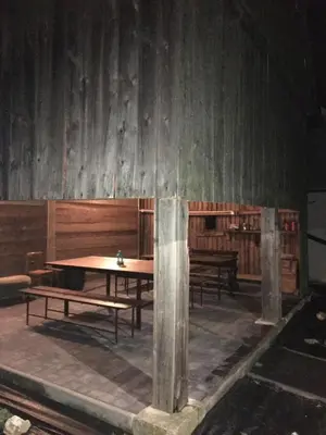 a wooden room with a table and benches in it at Nasza Polana Pokoje Noclegi Pieskowa Skała Ojców in Pieskowa Skała