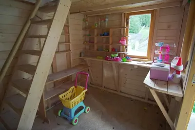 a staircase in a play room in a tiny house at Gościniec pod Lubomirem in Węglówka