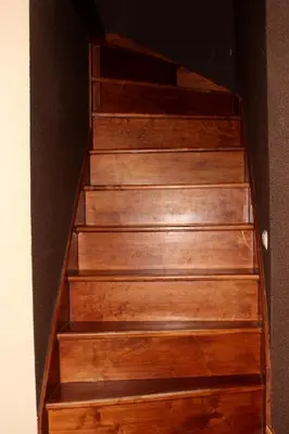 a set of wooden stairs in a room at Zawoja Chaty Górskie D5 in Zawoja