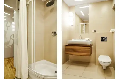 two images of a bathroom with a sink and a toilet at Krakow For You Main Square Apartments in Kraków
