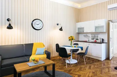 a living room with a couch and a table at Old Town Residence Bis in Kraków