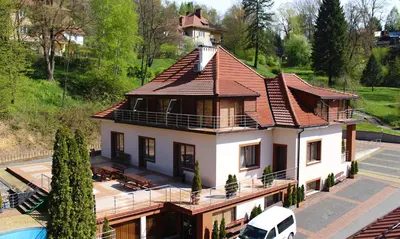an aerial view of a house with a roof at Hotel Łaziska in Czchów