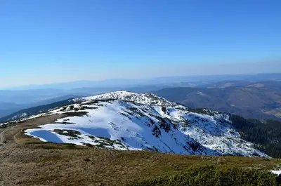 a view of a snow covered mountain at Dom na Mosornym Groniu in Zawoja