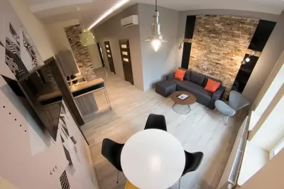 an overhead view of a living room with a couch at Yourplace M57 Apartments in Kraków