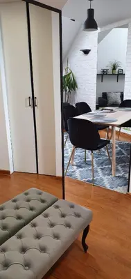 a living room with a table and a chair at Old Town, Apartment, Blich in Kraków