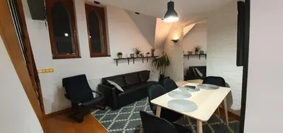 a living room with a table and a couch at Old Town, Apartment, Blich in Kraków