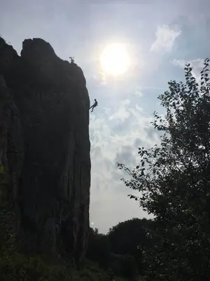 a person is rappelling off of a mountain at Leśna 6 - House with a garden in Bolechowice