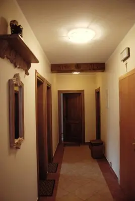 a hallway of a house with a door and a hallwayngth at Ośrodek Wczasowy Sokół in Rabka