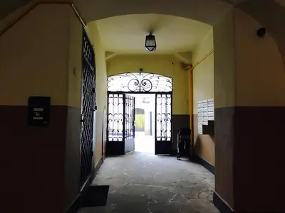 an entrance to a hallway with a door with a window at Venice Lagoon Apartment in Kraków