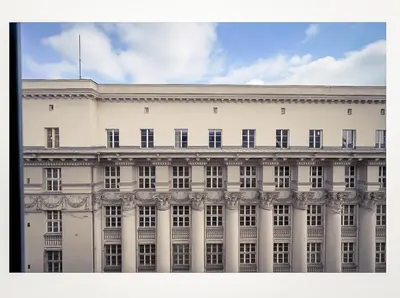 a large white building with many windows at Wielopole17 Max Apartment with AC in Kraków