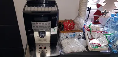 a coffee maker sitting on top of a table at Apartamenty Salt Delux in Wieliczka