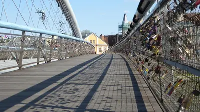 a bridge with a lot of people on it at Apartament Arkadia na Kazimierzu in Kraków