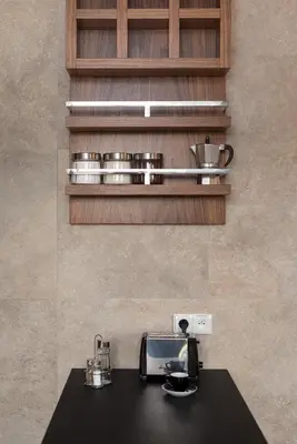 a kitchen with a counter top with a coffee maker at Apartament nad dachami Krakowa in Kraków