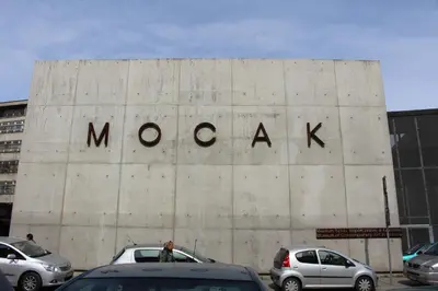 a large building with the word mocihad written on it at Przy Mocaku II in Kraków