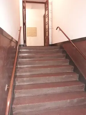 a set of stairs in an old building at Apartments Poland Kazimierz in Kraków