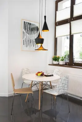 a dining room with a white table and chairs at Art Room Boutique Apartment in Kraków