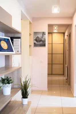 a hallway with a door in a building at Stawowa Premium Apartment - 69 m2 with sauna and private garage in Kraków