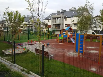 a park with a playground with a play set at Stawowa Premium Apartment - 69 m2 with sauna and private garage in Kraków