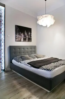 a bedroom with a large bed in a room at Cichy apartament w centrum Krakowa Salwator in Kraków