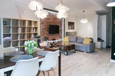 a living room with a couch and a table at Cichy apartament w centrum Krakowa Salwator in Kraków