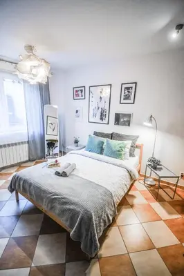 a bedroom with a large bed in a room at LION apartments - Your own apartment in Cracow in Kraków