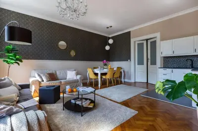 a living room with a couch and a table at Between Old Town and Kazimierz in Kraków