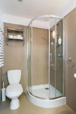 a bathroom with a shower and a toilet at Szeroka 33 D-F by Homeprime in Kraków