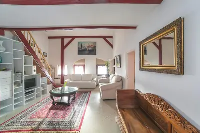 an overhead view of a living room with white furniture at Residence B&B La Fontaine Aparthotel in Kraków
