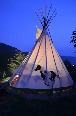 a tent with a picture of a horse in it at Agroturystyka Nad Jeziorem-Osada Indiańska in Czchów