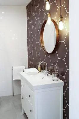 a bathroom with a sink and a mirror at Cracovia in Kraków