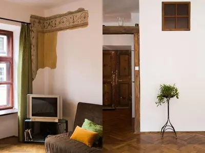 a living room with a couch and a tv at Nicholas Studio in Kraków