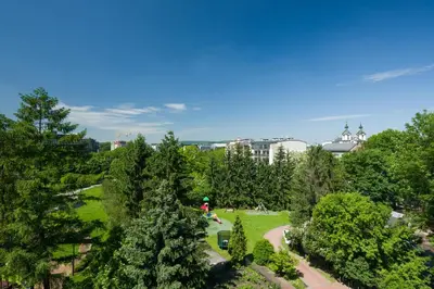 an overhead view of a park with trees at Kazimierz Apartment in Kraków