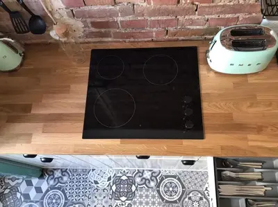a stove top oven sitting on top of a counter at Przestrzenny apartament w centrum Krakowa. in Kraków