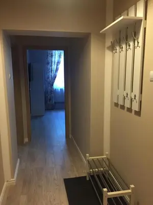 a room with a hallway with at Apartament Romantic in Oświęcim