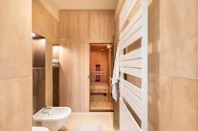 a small bathroom with a sink and a toilet at Krakowhomes in Kraków